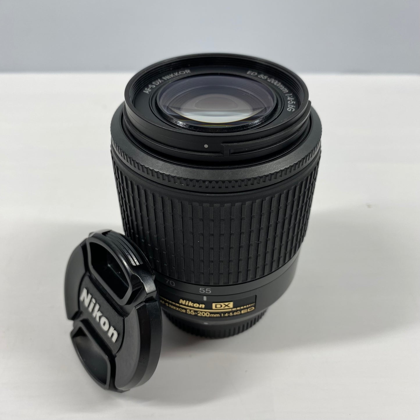 Nikon AF-S DX NIKKOR 55-200mm f/4-5.6 G ED with both Caps and Hood