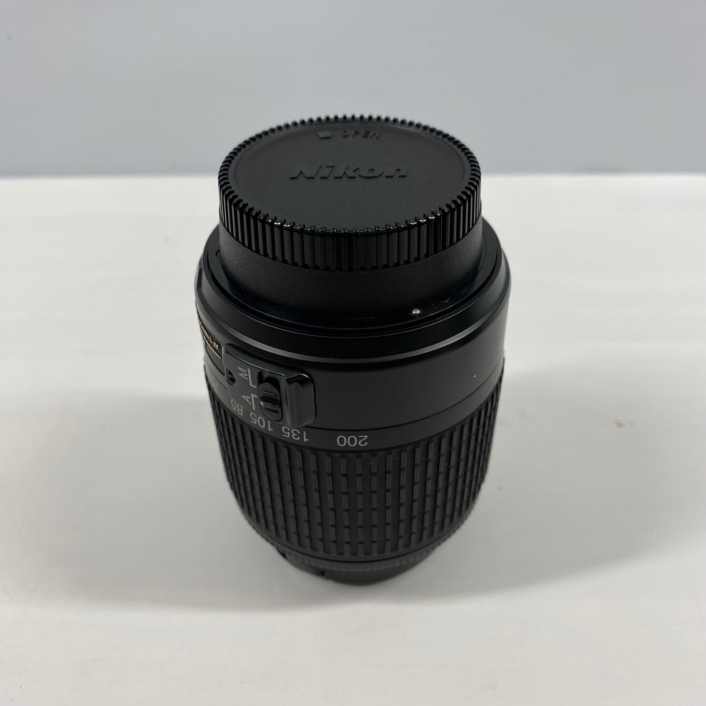 Nikon AF-S DX NIKKOR 55-200mm f/4-5.6 G ED with both Caps and Hood